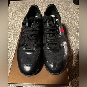 Gucci sneakers size 9 slightly used.